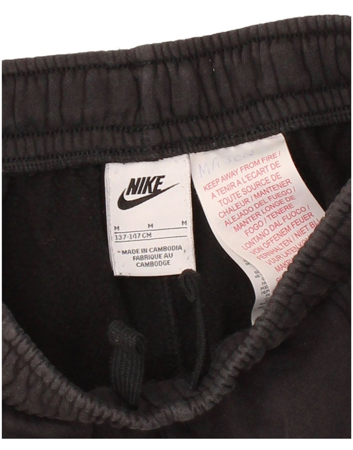 NIKE Boys Graphic Tracksuit Trousers Joggers 10-11 Years Medium Black