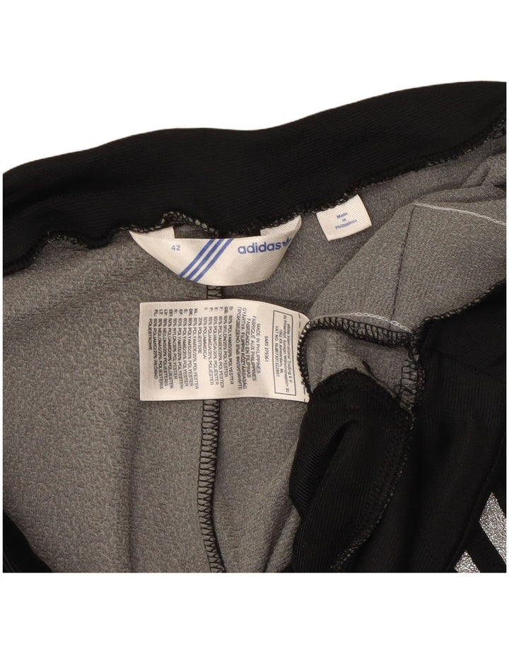 Adidas Træningsdragtsbukser til kvinder IT 42 Medium Sort Polyamid