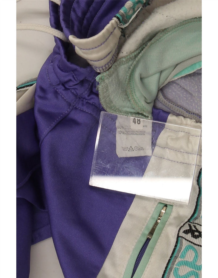 ASICS Mens Graphic Tracksuit Trousers IT 48 Medium  Purple Colourblock Vintage Asics and Second-Hand Asics from Messina Hembry 