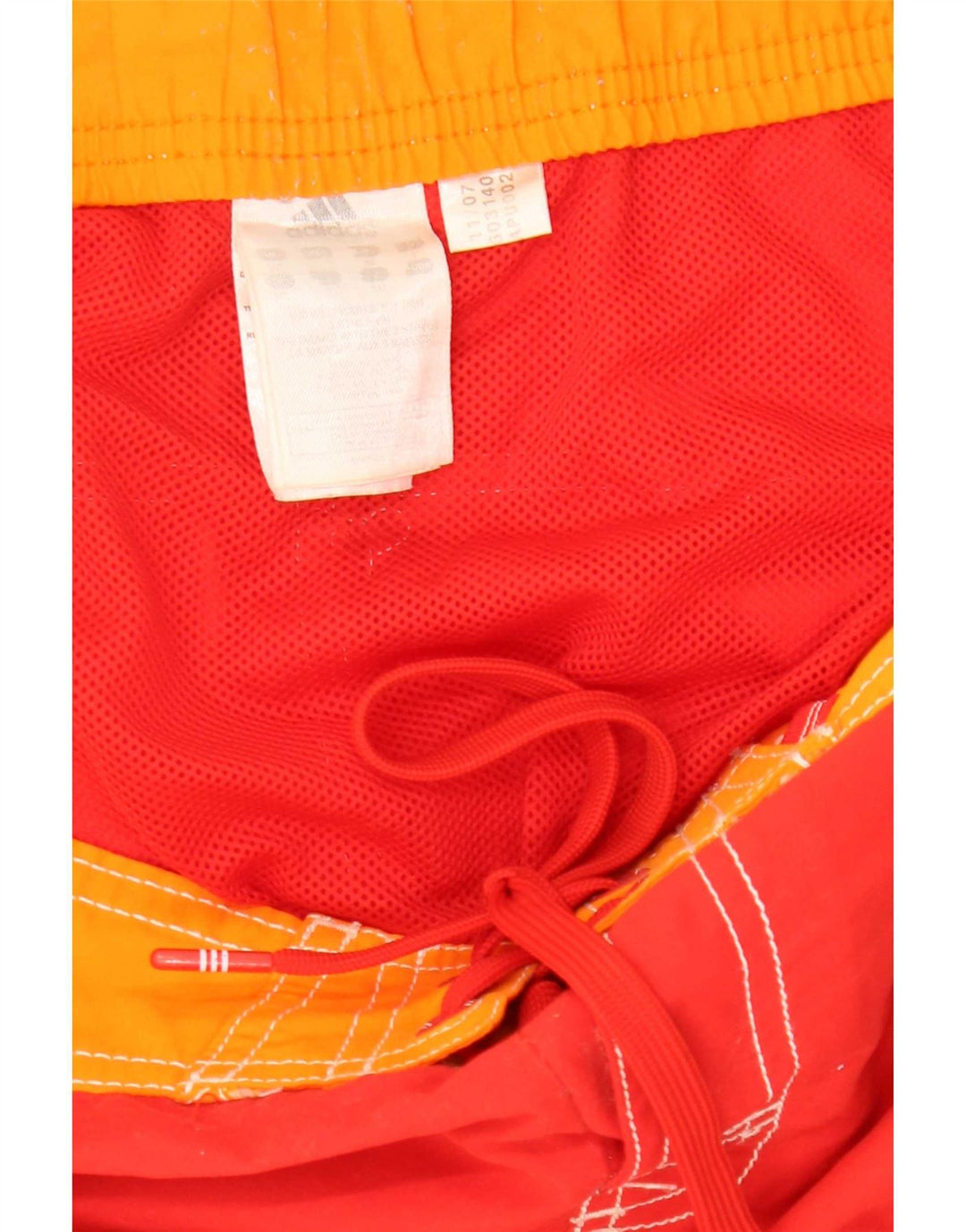 Adidas grafiske badeshorts til mænd Medium Rød Colourblock Polyester