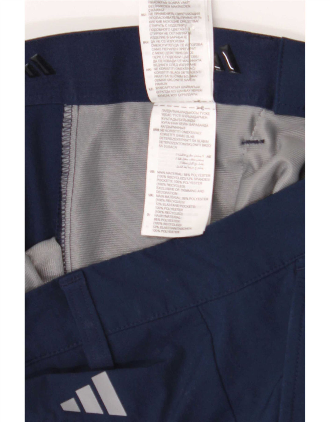 Adidas Slim Chino-bukser til mænd W28 L34 Marineblå polyester