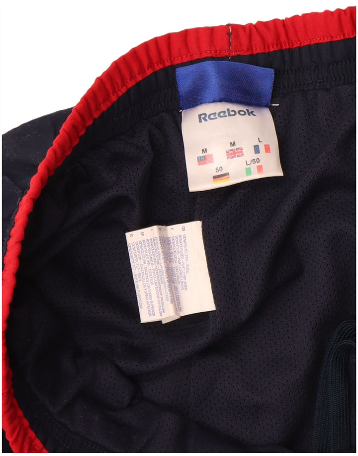 Reebok Træningsdragt til mænd Joggers Medium Navy Blue Colourblock