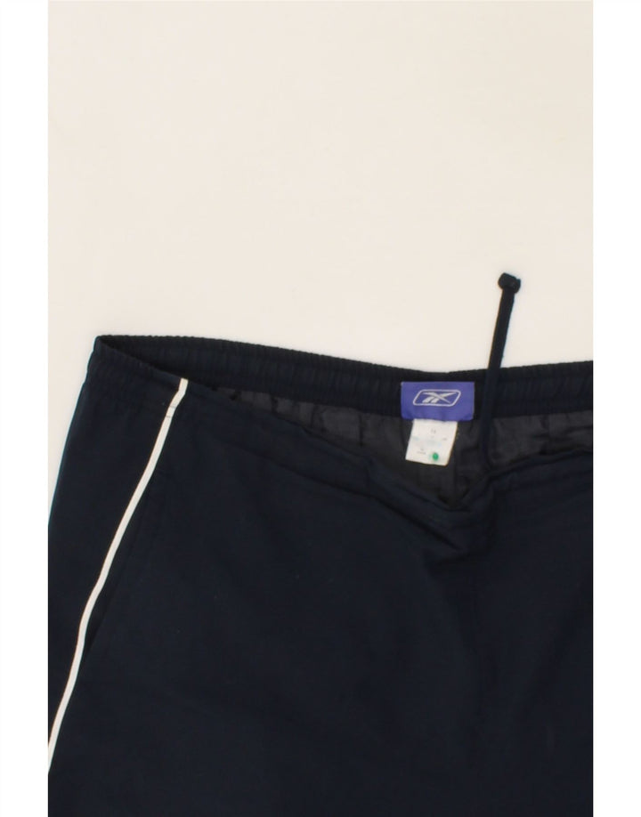 REEBOK Womens Capri Tracksuit Trousers UK 14 Large  Navy Blue Polyester Vintage Reebok and Second-Hand Reebok from Messina Hembry 