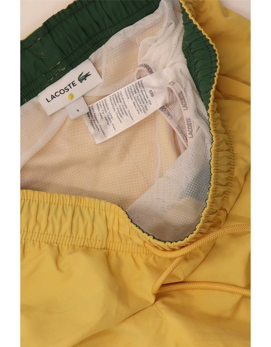 Lacoste svømmeshorts til kvinder UK 10 Små gul polyester