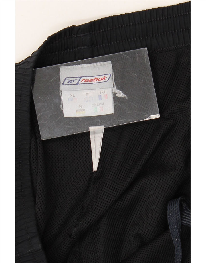 REEBOK Træningsdragt til mænd Joggers XL Sort
