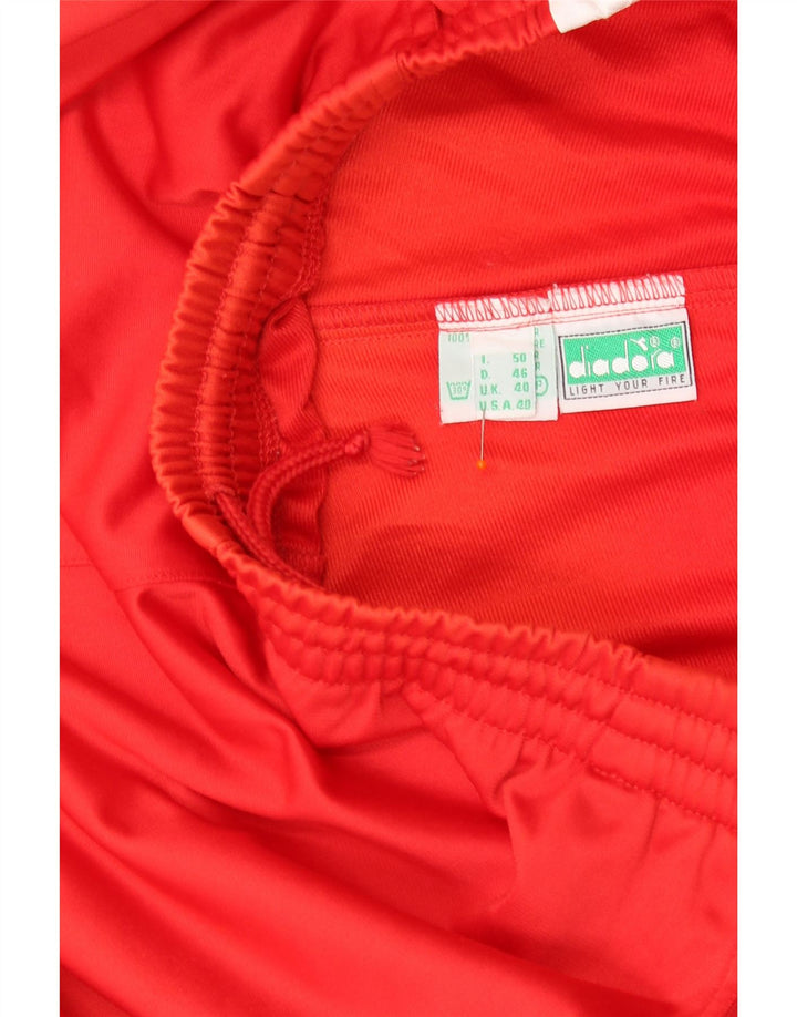 DIADORA Grafiske træningsdragtbukser til mænd UK 40 Medium Red Colourblock