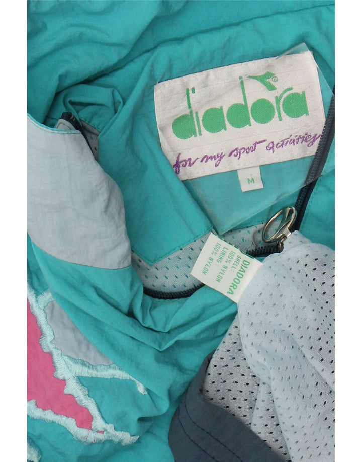 DIADORA Herre Loose Fit træningsdragt Topjakke Medium Blue Colourblock Nylon