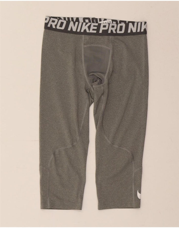 NIKE Girls Dri Fit Graphic Capri Leggings 12-13 Years Large Grey Polyester Vintage Nike and Second-Hand Nike from Messina Hembry 