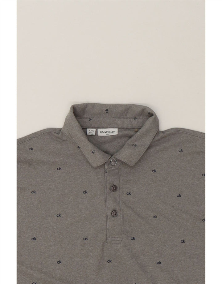 CALVIN KLEIN Mens Graphic Polo Shirt XL Grey Polyester Vintage Calvin Klein and Second-Hand Calvin Klein from Messina Hembry 