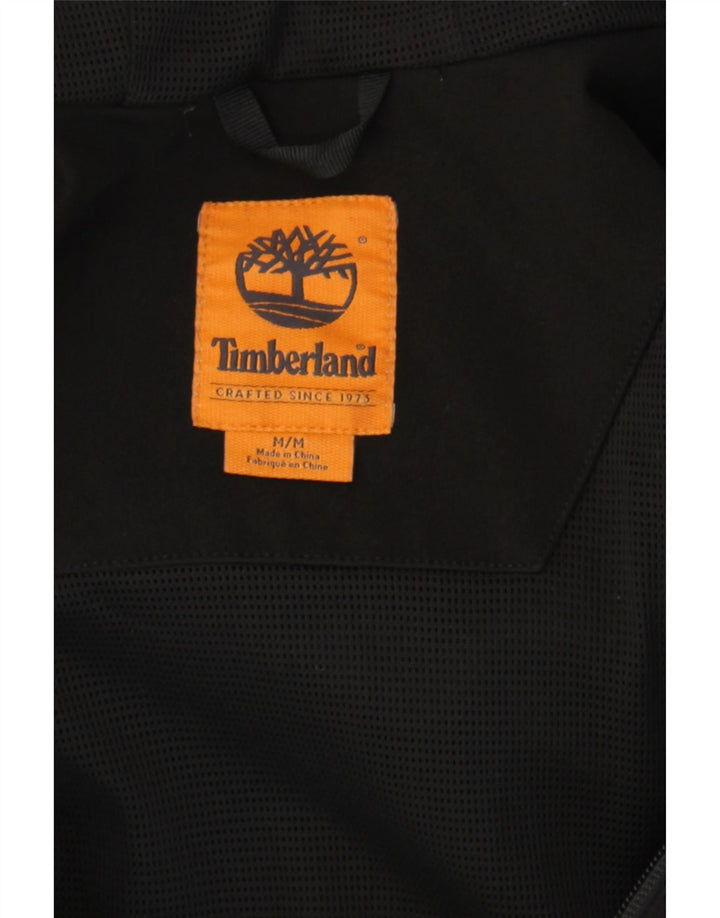 TIMBERLAND Mens Graphic Hooded Tracksuit Top Jacket Medium Black Polyester Vintage Timberland and Second-Hand Timberland from Messina Hembry 