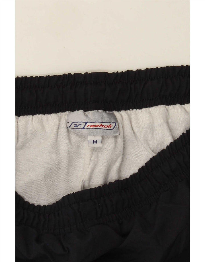 Reebok Træningsdragtsbukser til mænd Medium Marineblå