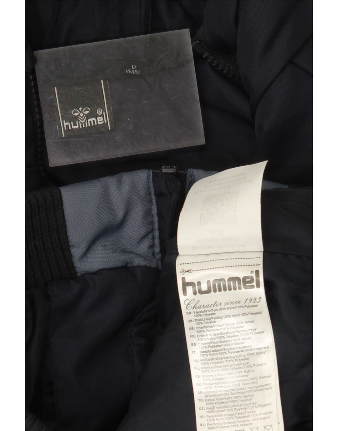 HUMMEL grafisk polstret hættejakke til drenge 11-12 år marineblå farveblok