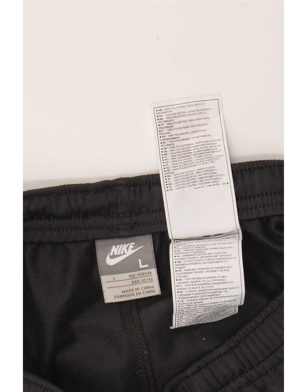 Nike Træningsdragtsbukser til drenge 12-13 år Large Grå Colourblock Polyester