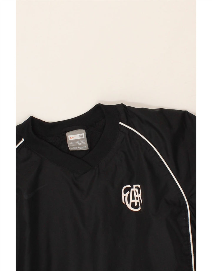 NIKE Boys Pullover Tracksuit Top 10-11 Years Medium  Black Nylon Vintage Nike and Second-Hand Nike from Messina Hembry 