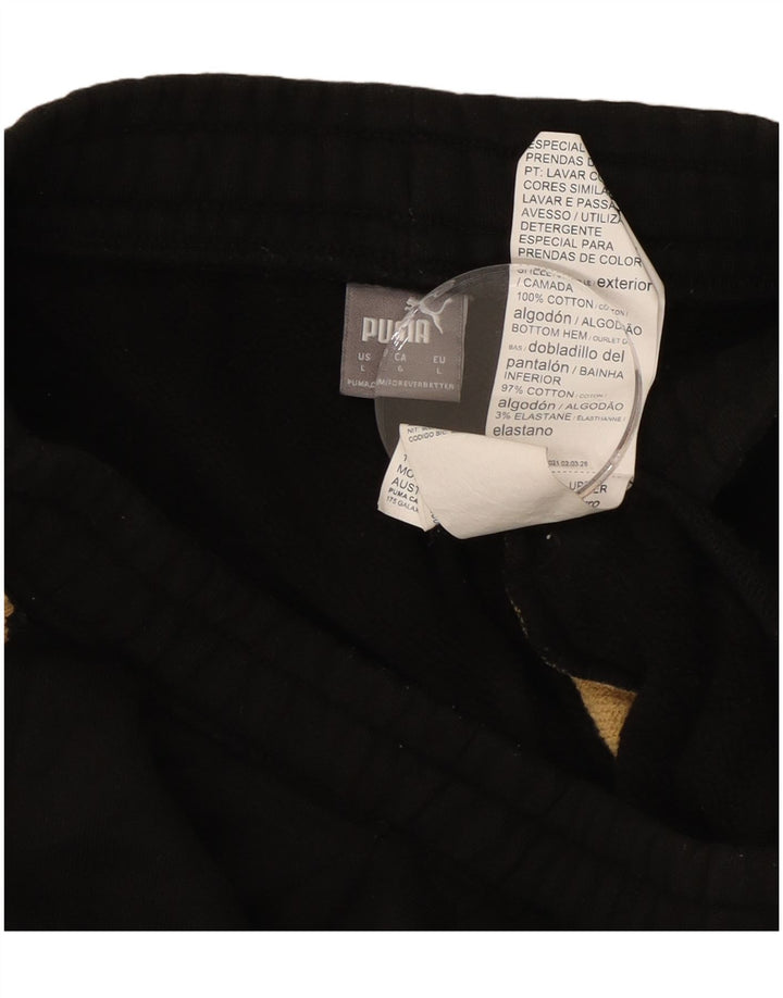 PUMA træningsdragt til kvinder Joggers UK 14 Stort sort dyreprint