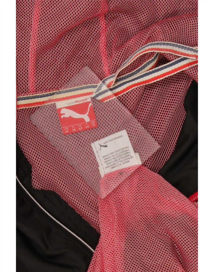 PUMA Regnjakke med hætte til kvinder UK 12 Medium Sort