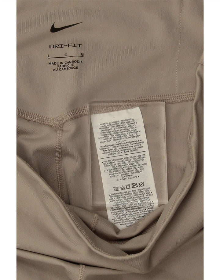 NIKE Womens Dri Fit Graphic Leggings UK 14 Large  Beige Polyester Vintage Nike and Second-Hand Nike from Messina Hembry 