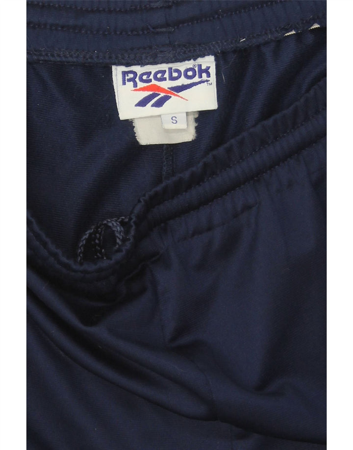 REEBOK Mens Graphic Tracksuit Trousers Joggers Small  Navy Blue Vintage Reebok and Second-Hand Reebok from Messina Hembry 
