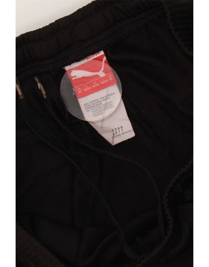 Puma Træningsdragtsbukser til kvinder UK 14 Medium Sort Polyester