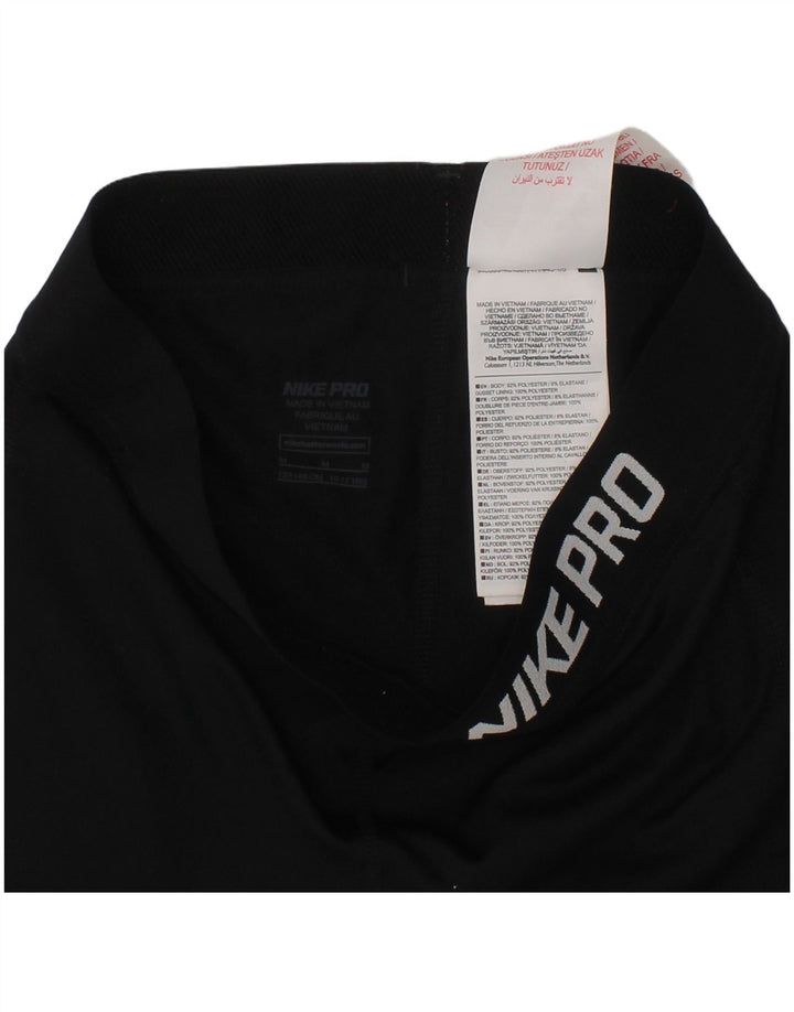 NIKE Girls Dri Fit Graphic Leggings 10-11 Years Medium Black Polyester