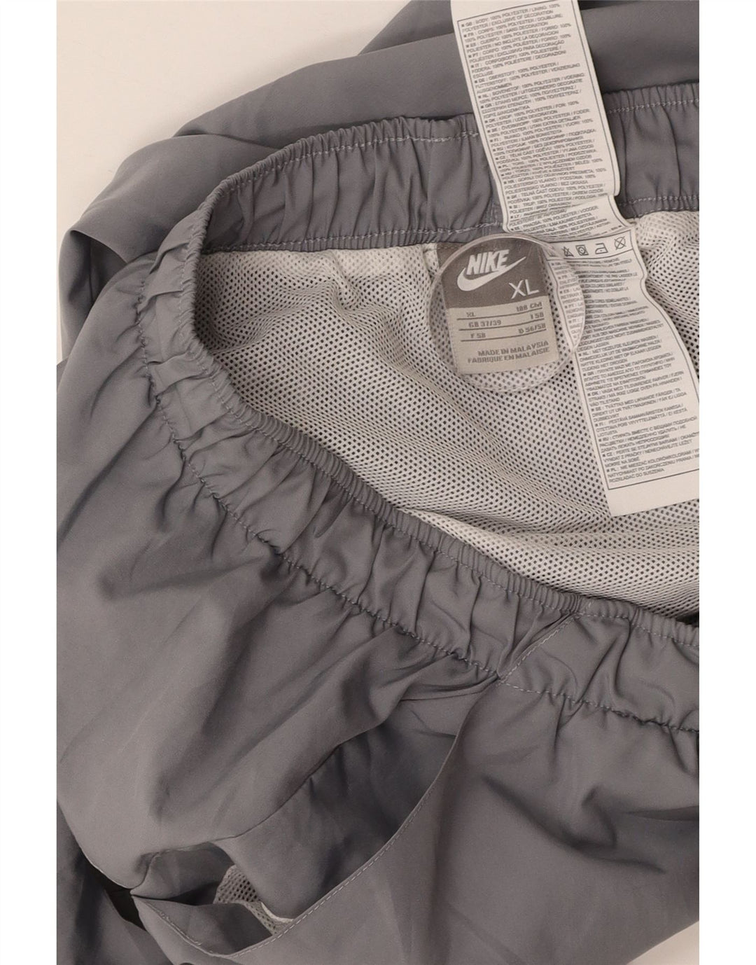 NIKE Sportsshorts til mænd XL Grå Colourblock Polyester