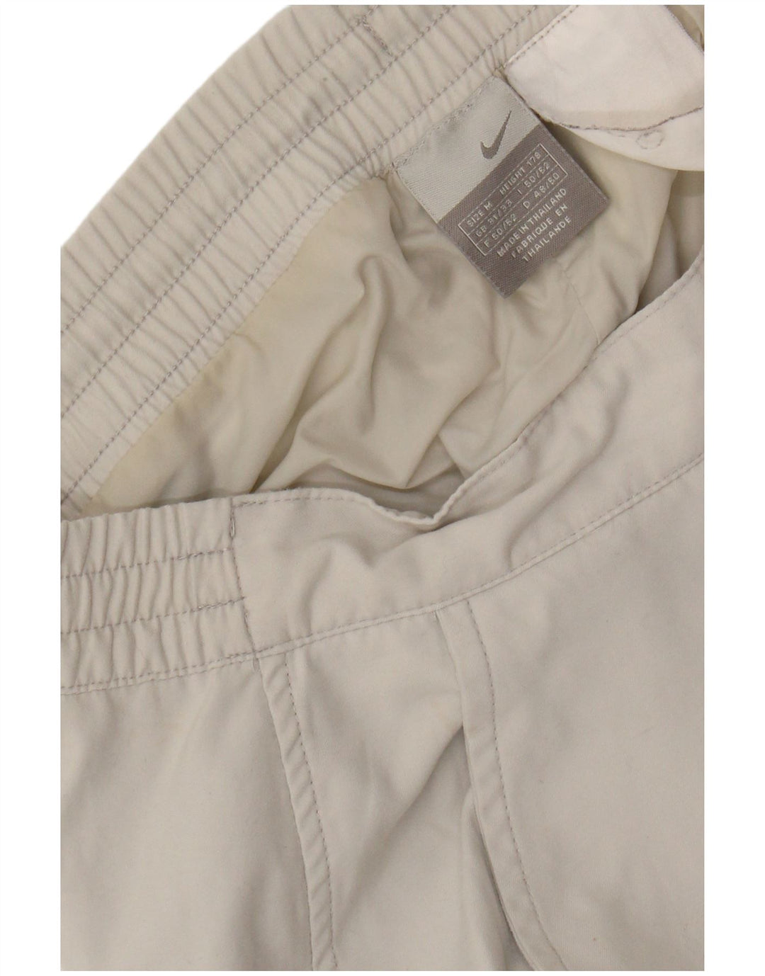 NIKE Windbreaker-bukser til mænd Medium W32 L31 Hvid Colourblock