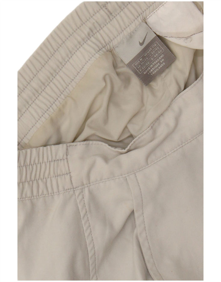 NIKE Windbreaker-bukser til mænd Medium W32 L31 Hvid Colourblock