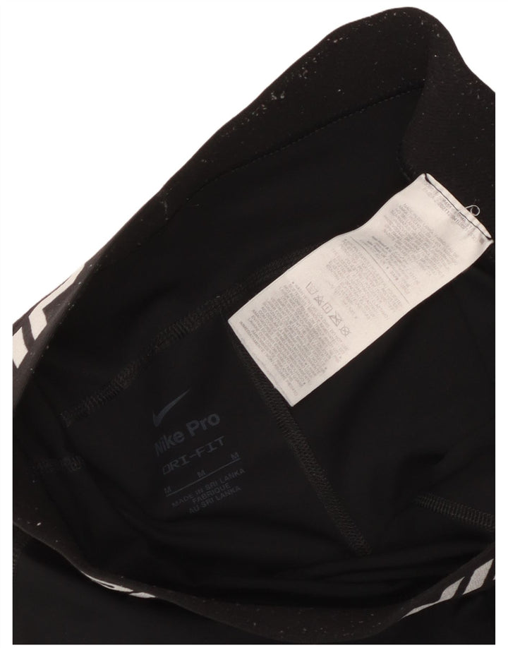 Nike Dame Dri Fit grafiske sportsshorts UK 12 Medium Sort Polyester