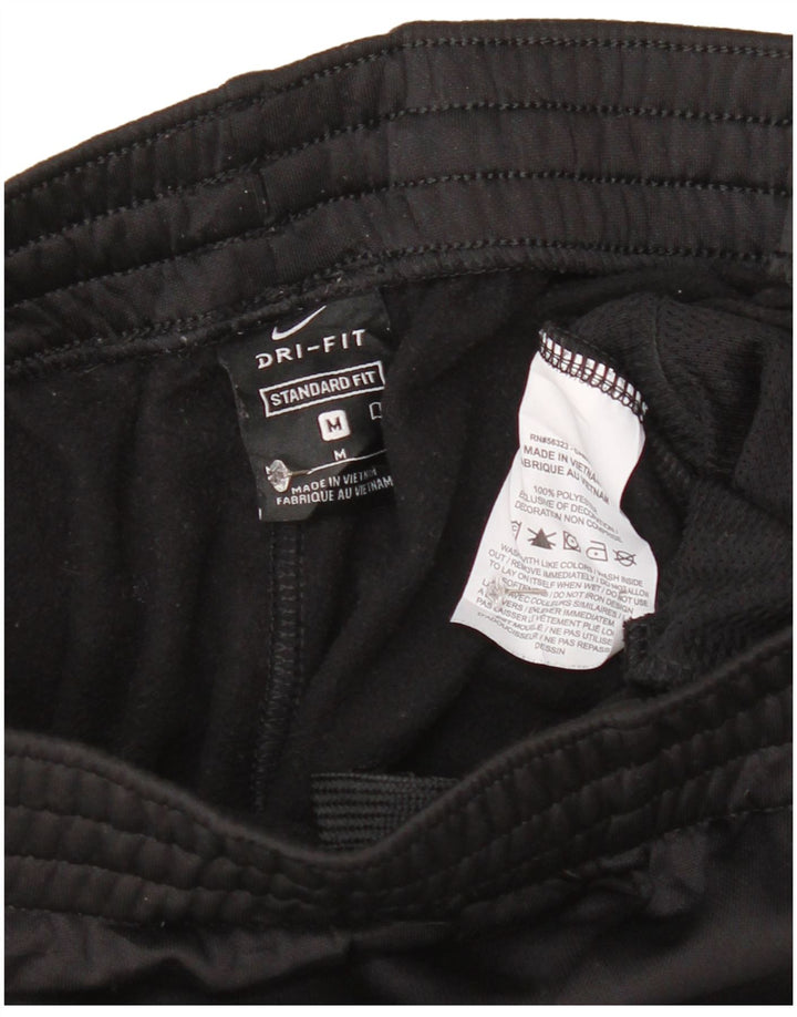 Nike Boys Grafisk træningsdragt Bukser Joggers 10-11 år Medium Sort