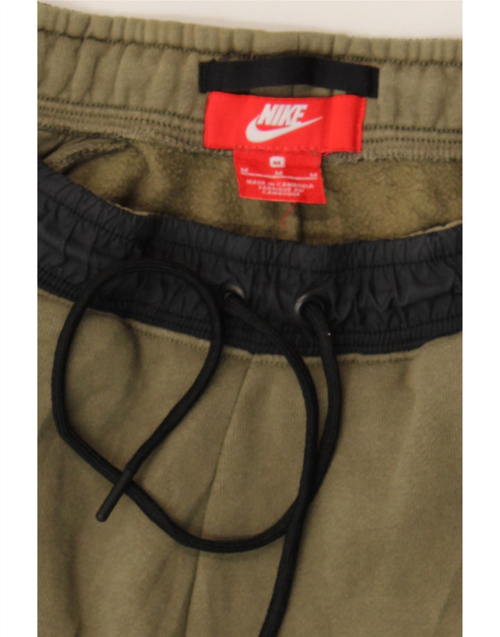 NIKE Mens Tracksuit Trousers Joggers Medium  Khaki Cotton Vintage Nike and Second-Hand Nike from Messina Hembry 