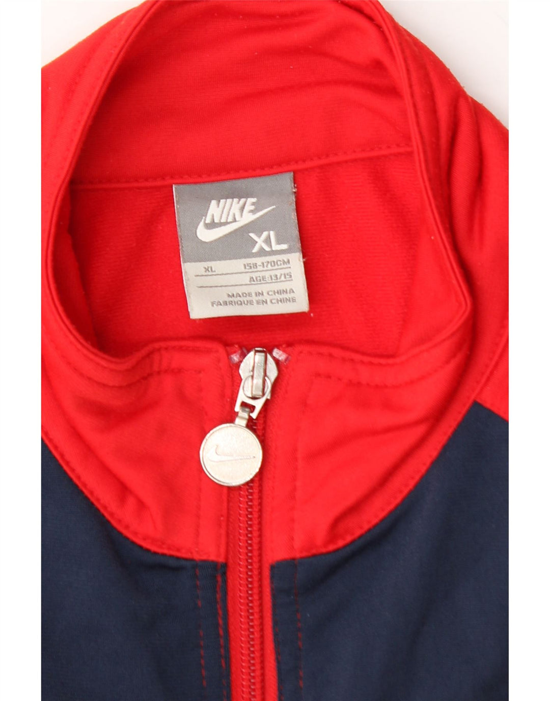 NIKE Boys Graphic Tracksuit Top Jacket 13-14 Years XL Red Colourblock Vintage Nike and Second-Hand Nike from Messina Hembry 