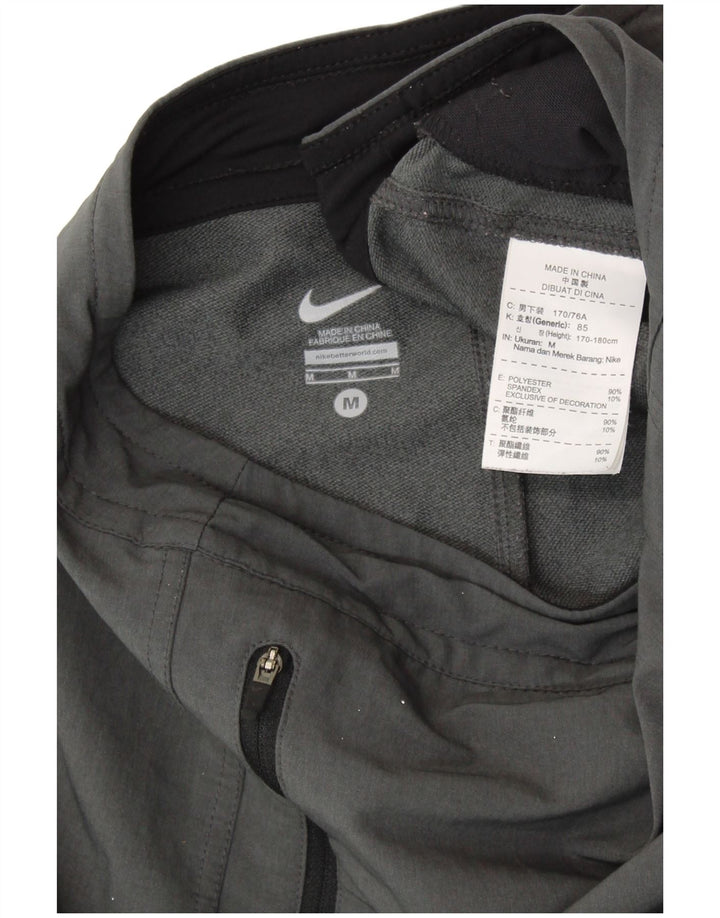 NIKE Træningsdragtsbukser til mænd mellemgrå polyester