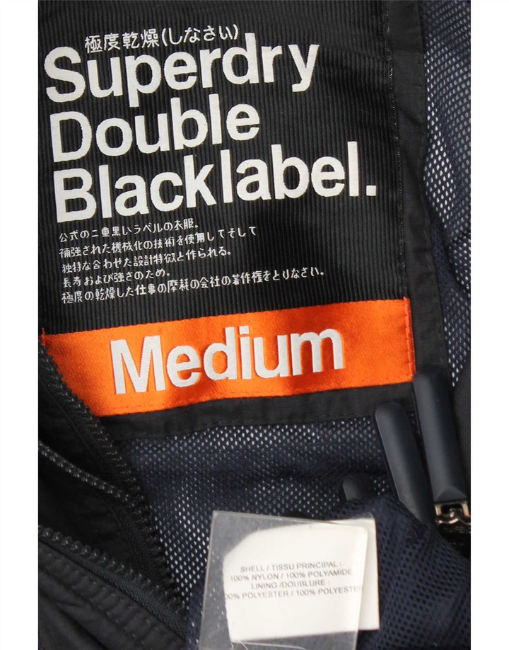 Superdry Grafisk regnjakke til kvinder UK 12 Medium Navyblå nylon