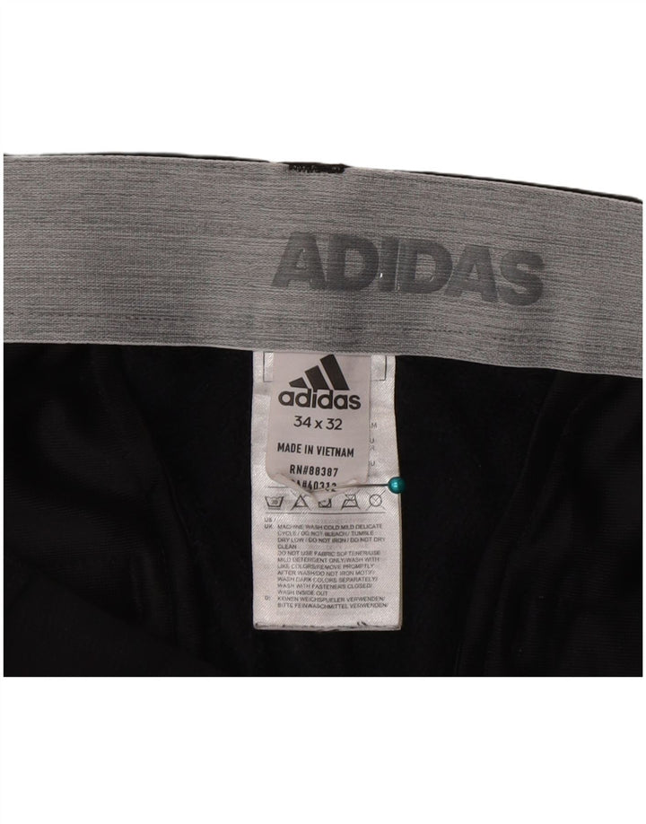 Adidas Herre Slim Chino Bukser W34 L32 Sort Polyester