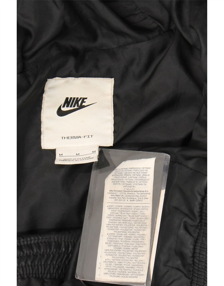 Nike Dame Therma-Fit grafisk, polstret hættejakke UK 14 Medium Sort