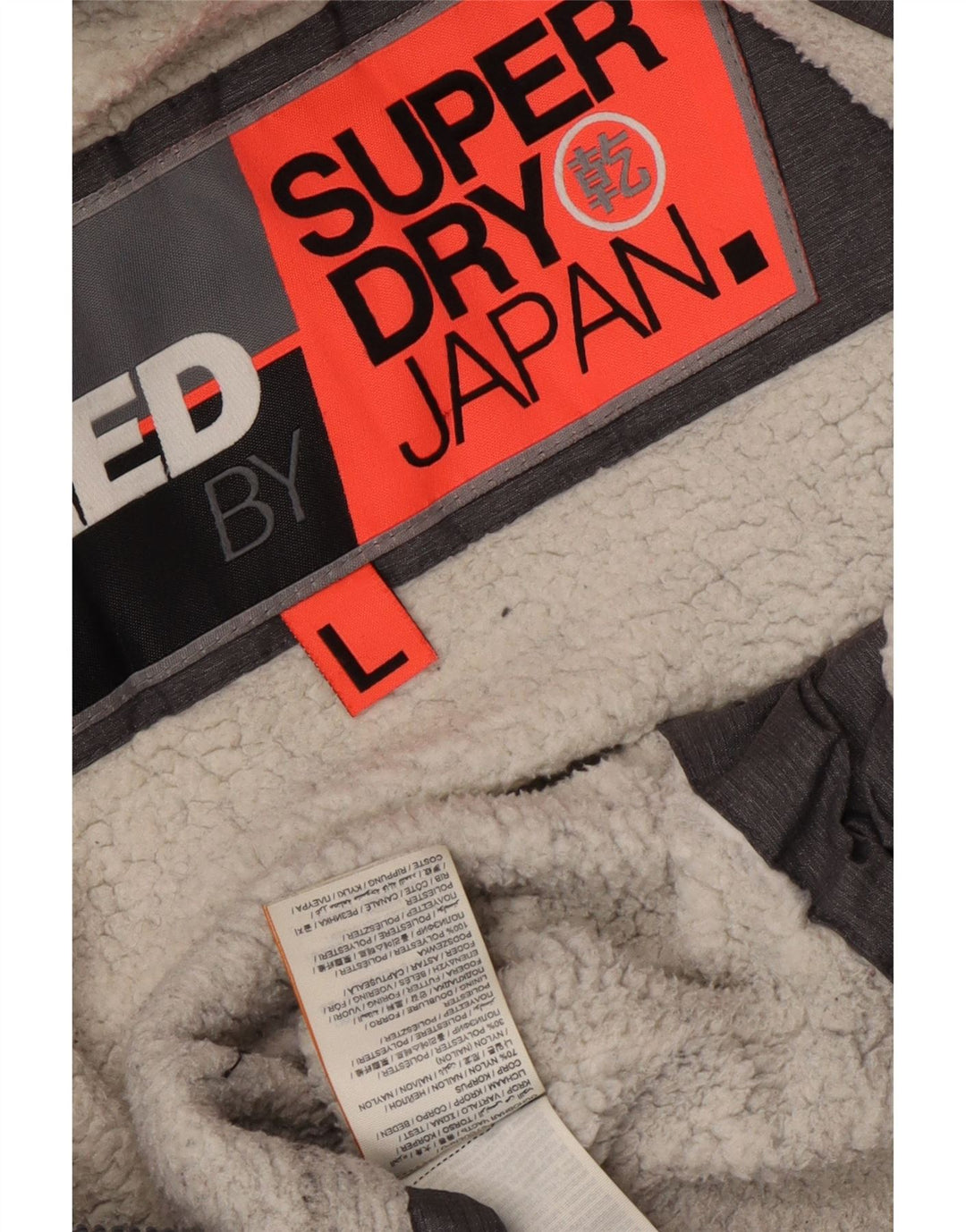 Superdry vindjakke med hætte til kvinder UK 16 Stor grå nylon