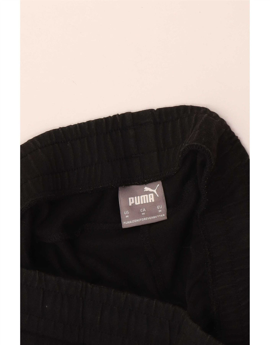 Puma Træningsdragtsbukser til kvinder UK 12 Medium Sort