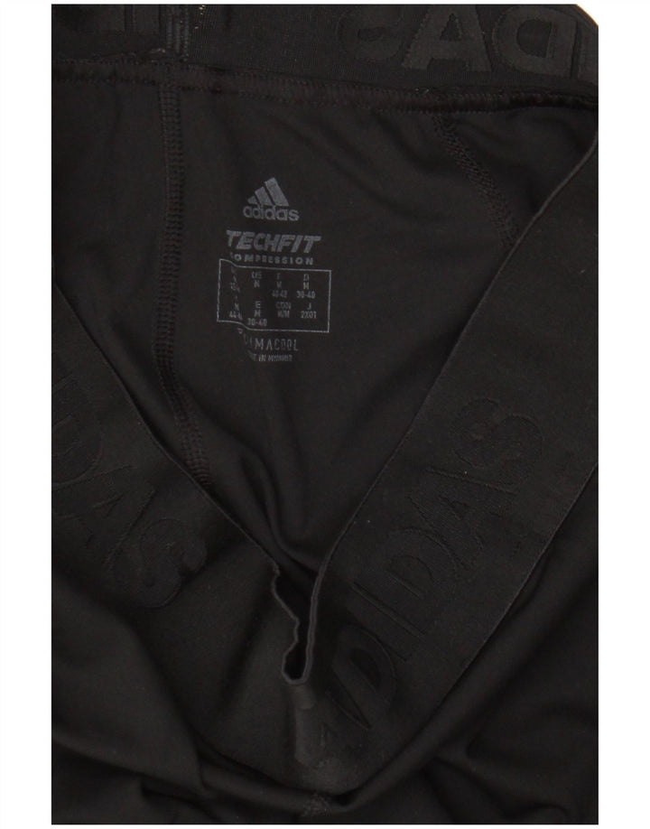 Adidas Graphic Leggings til kvinder UK 12/14 Medium Black
