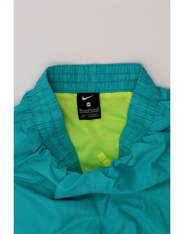 NIKE Boys Graphic Sport Shorts 10-11 Years Medium Turquoise Vintage Nike and Second-Hand Nike from Messina Hembry 
