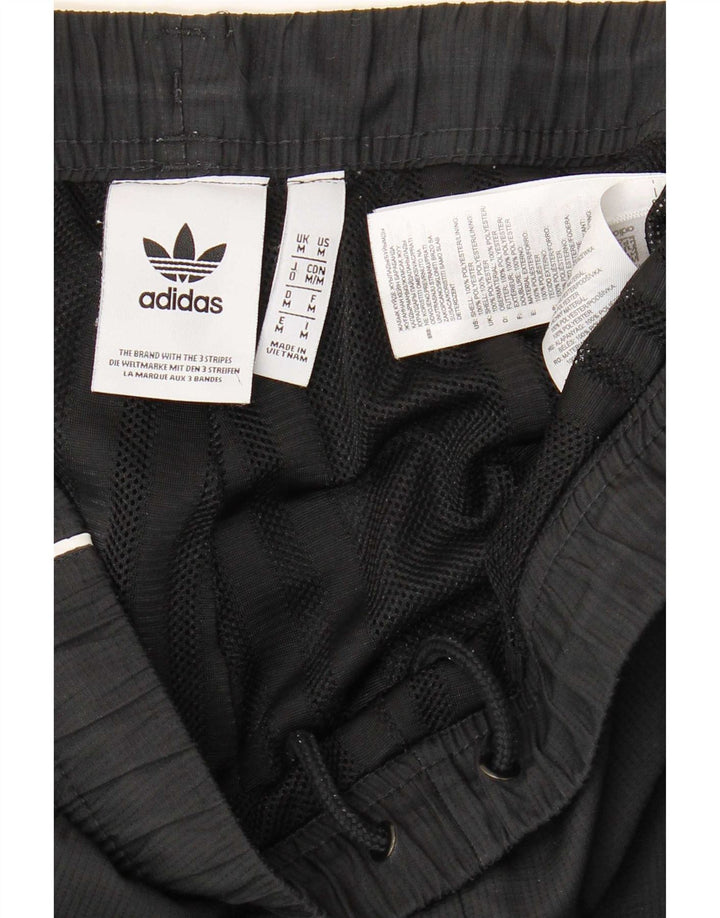 Adidas Træningsdragt til mænd Joggers Medium Sort Colourblock Polyester