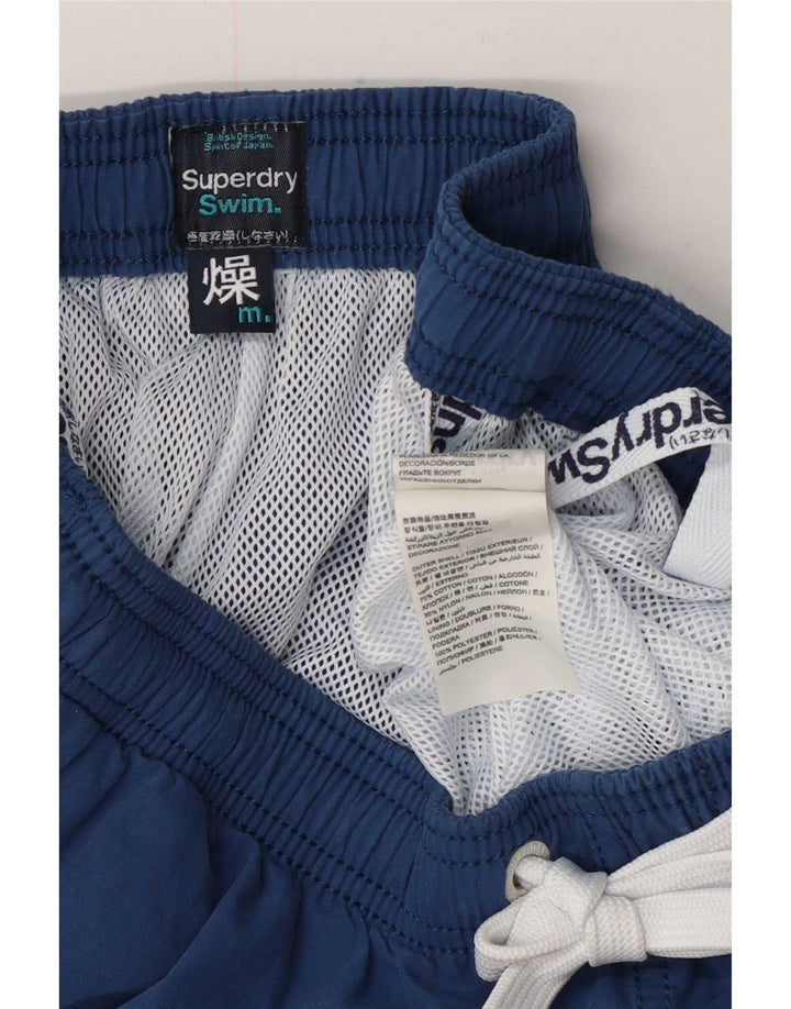 Superdry Grafiske svømmeshorts til mænd Medium marineblå Colourblock Bomuld