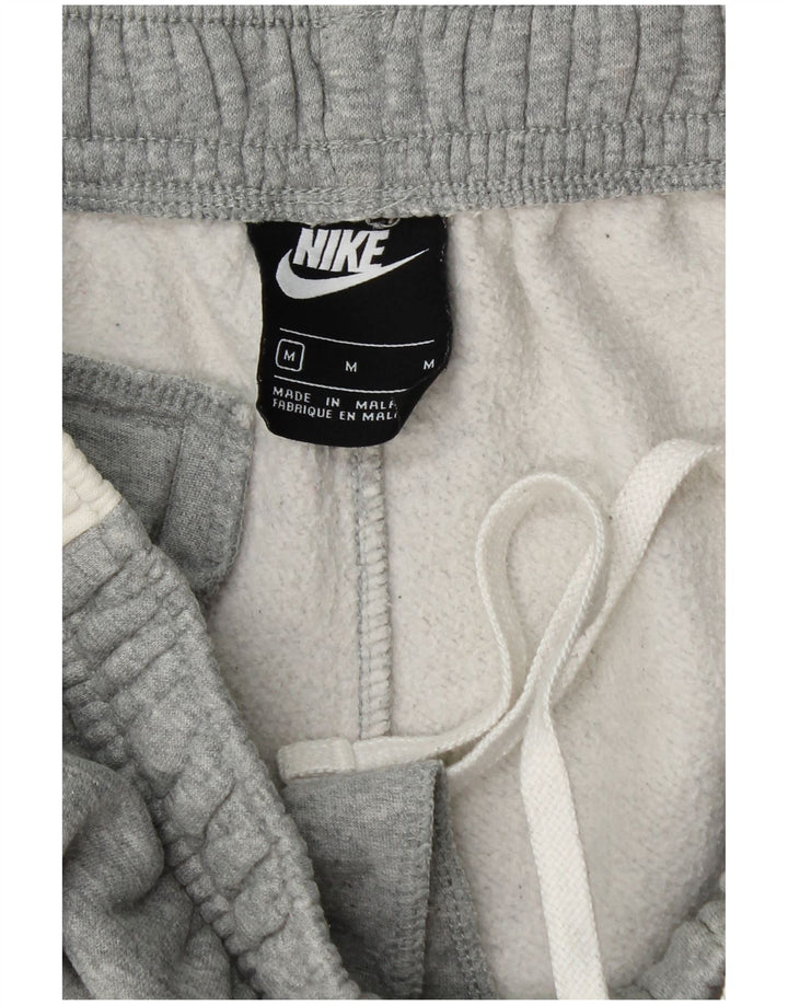 NIKE Mens Tracksuit Trousers Joggers Medium Grey Colourblock Cotton