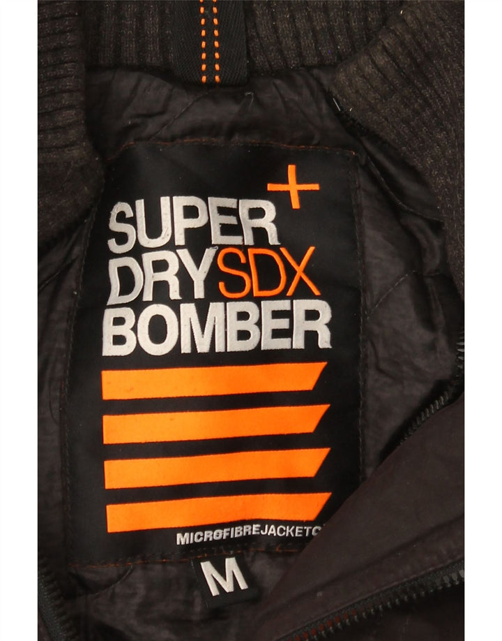 Superdry Bomberjakke med hætte til mænd UK 38 Medium Sort