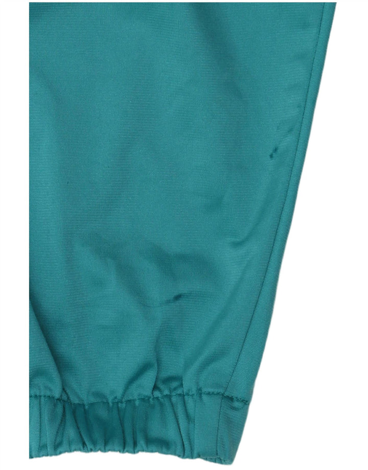 Diadora træningsdragt topjakke til kvinder UK 12 Medium Turkis Colourblock
