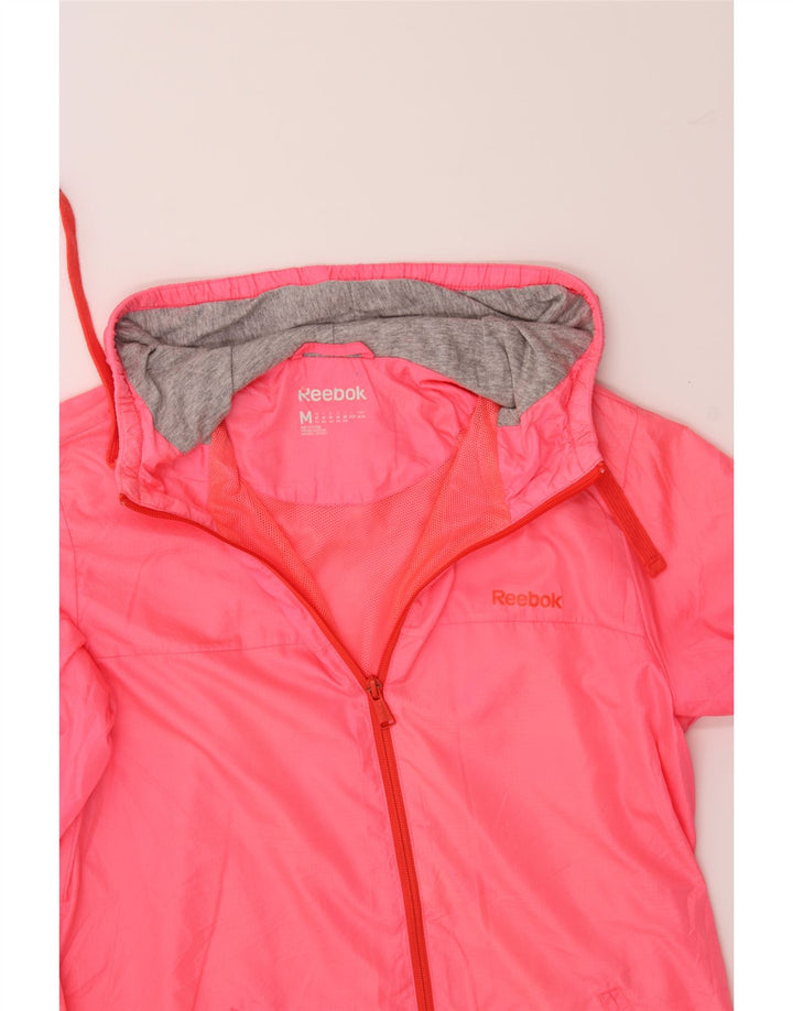 REEBOK Womens Hooded Rain Jacket UK 12/14 Medium Pink Nylon Vintage Reebok and Second-Hand Reebok from Messina Hembry 