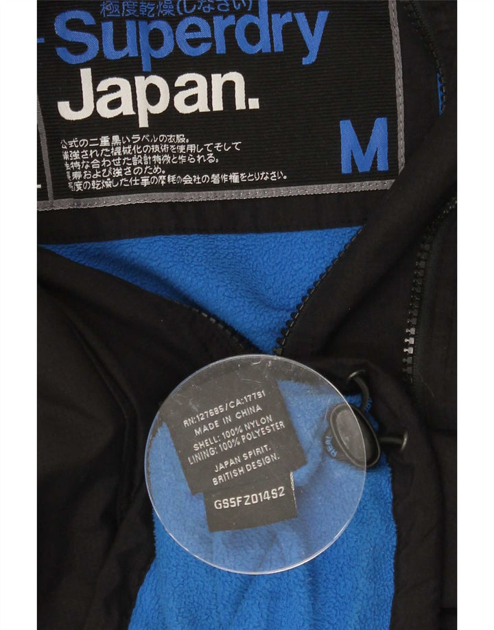 Superdry vindjakkejakke med hætte til kvinder UK 14 Medium Sort Nylon
