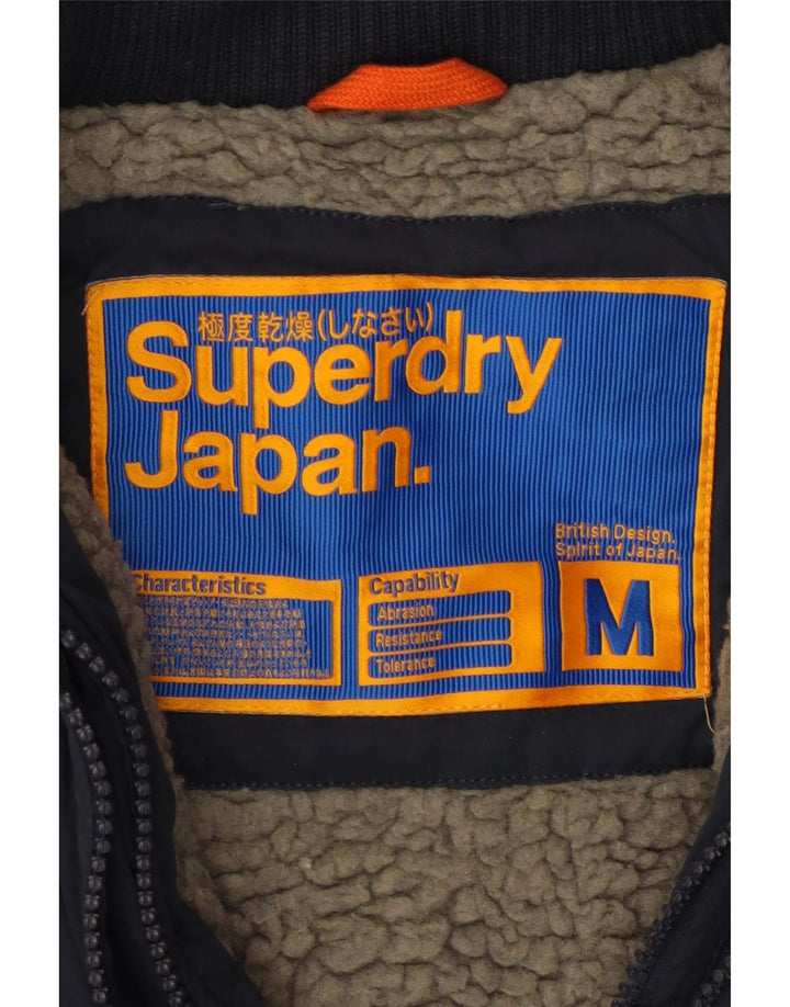 SUPERDRY vindjakke med hætte til kvinder UK 14 Mellem marineblå polyester