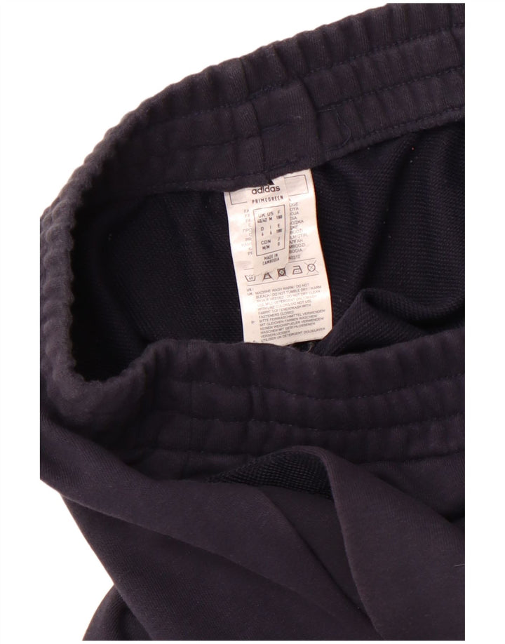 ADIDAS Træningsdragt til mænd Joggers UK 40/42 Medium marineblå bomuld