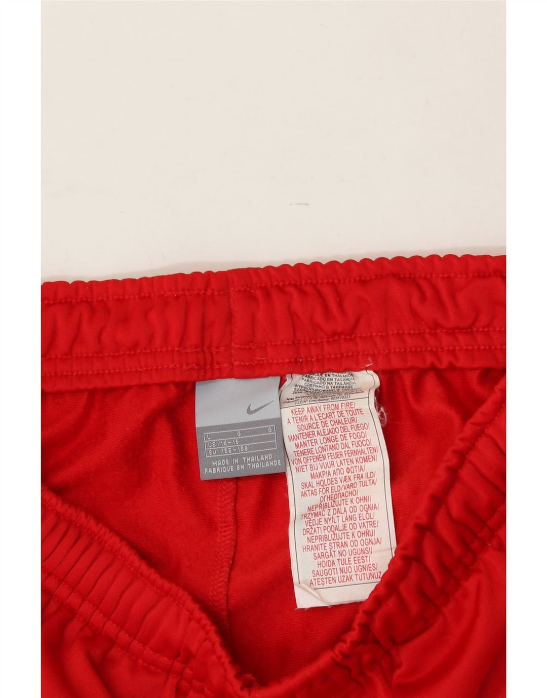 NIKE Girls Tracksuit Trousers 14-15 Years Large Red Colourblock Polyester Vintage Nike and Second-Hand Nike from Messina Hembry 