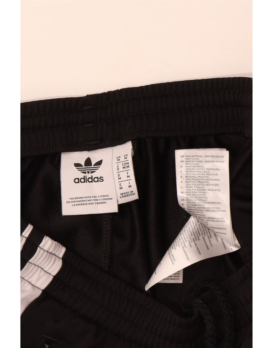 ADIDAS Grafisk træningsdragt bukser til mænd Medium Sort Colourblock Polyester